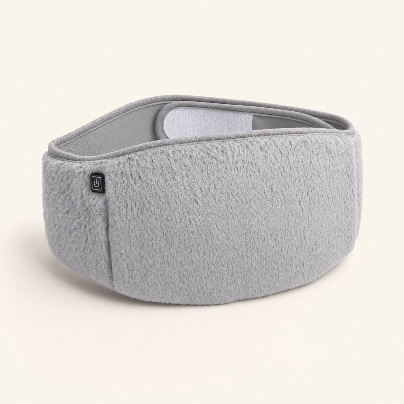 The FuzzyPouch Warmer Belt packshot on a cream ground