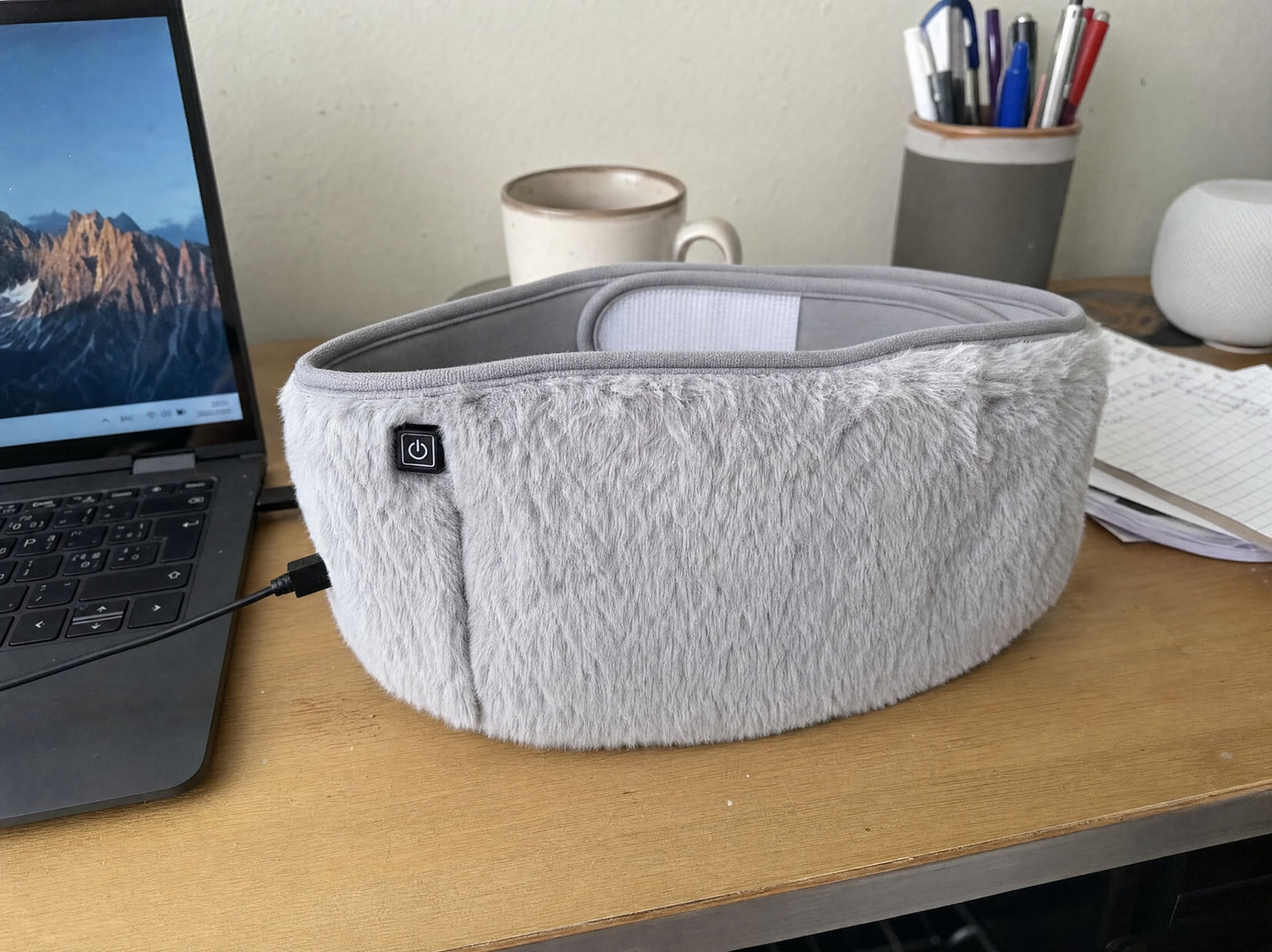 A customer photo of the FuzzyPouch on a home desk