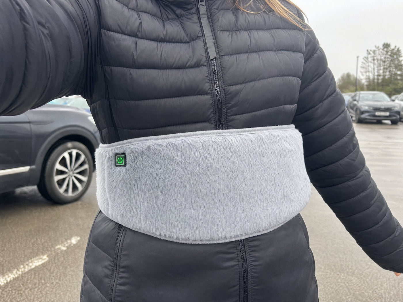 A customer photo of the FuzzyPouch worn at the waist outdoors
